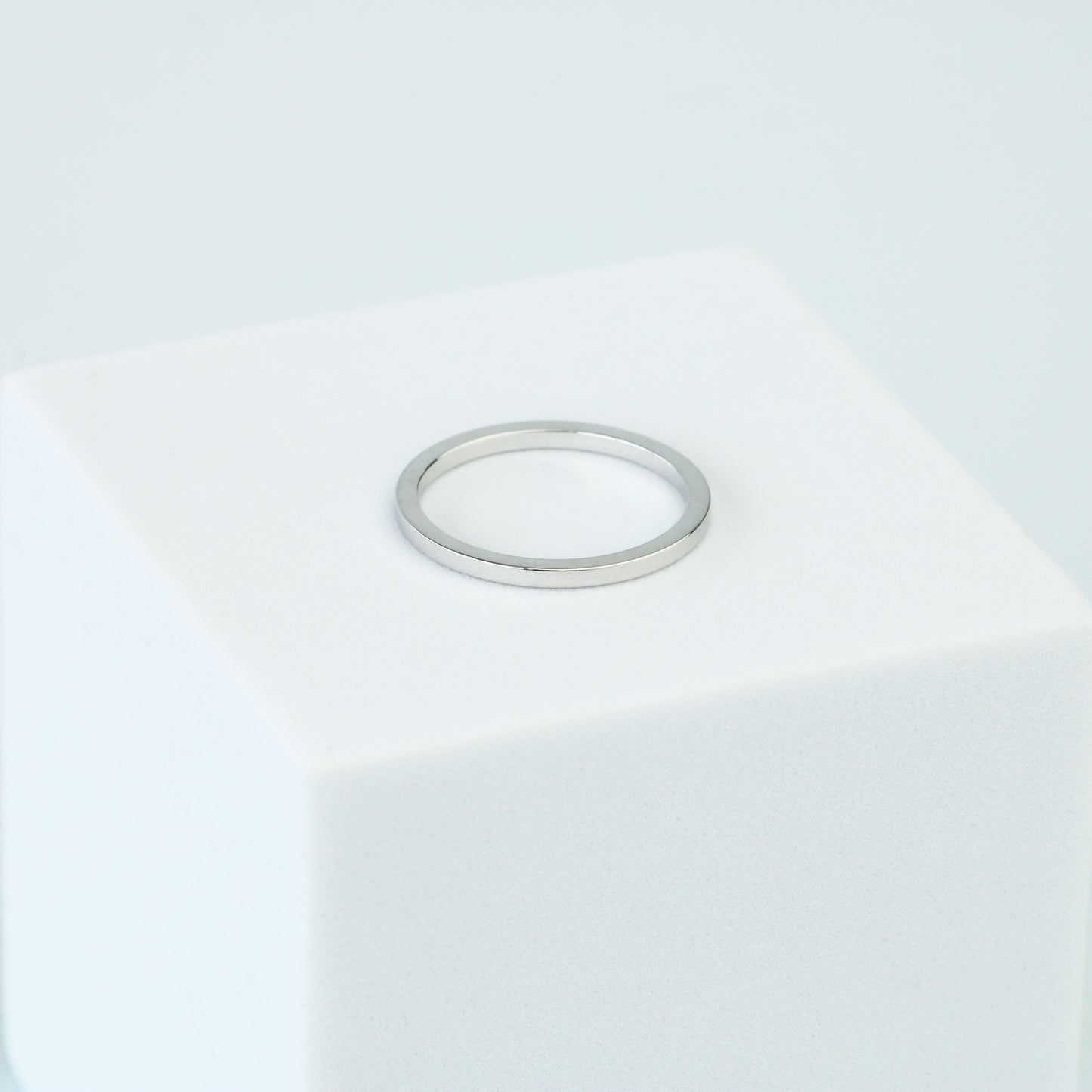 Silver ring on a white background