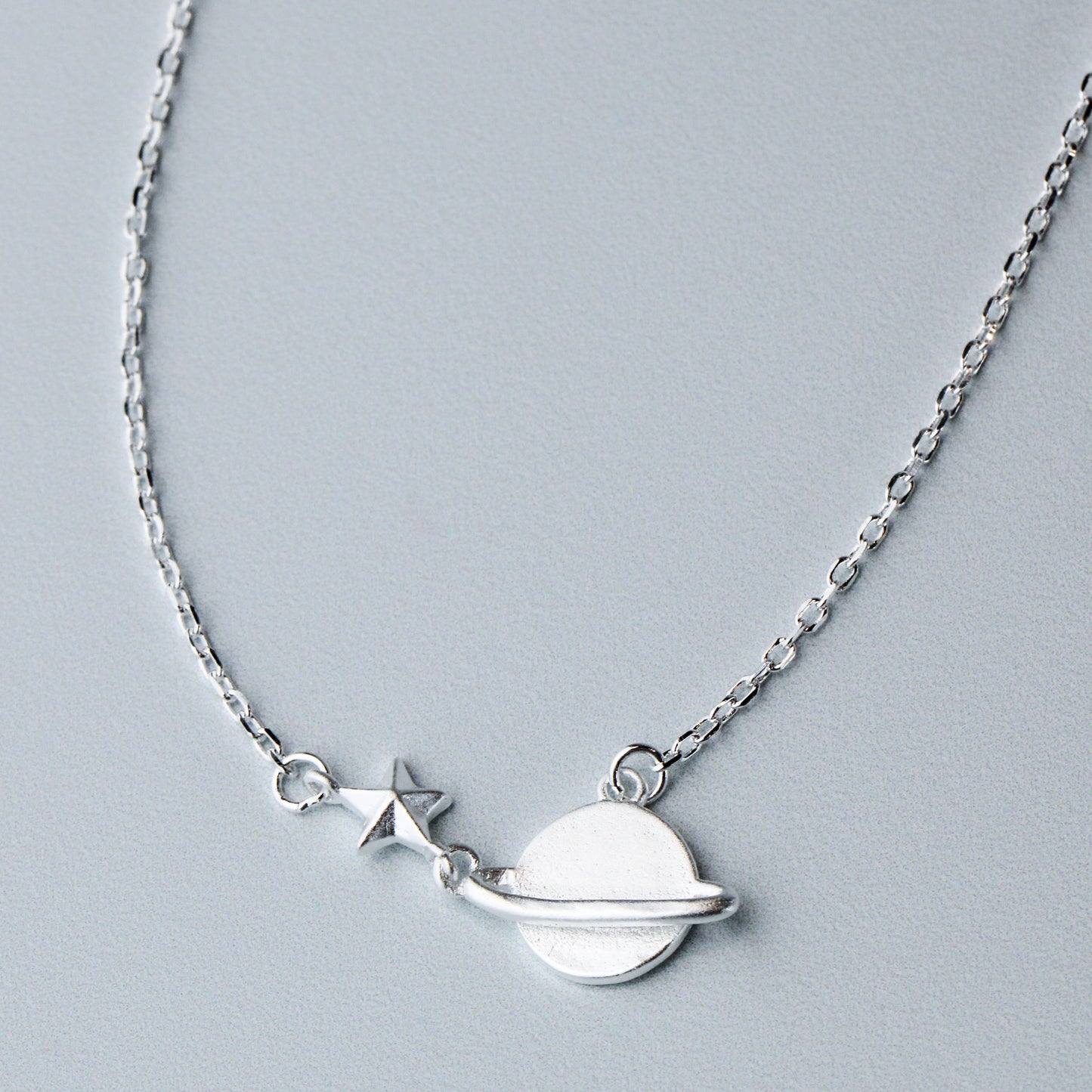 Saturn and Star Pendant Necklace