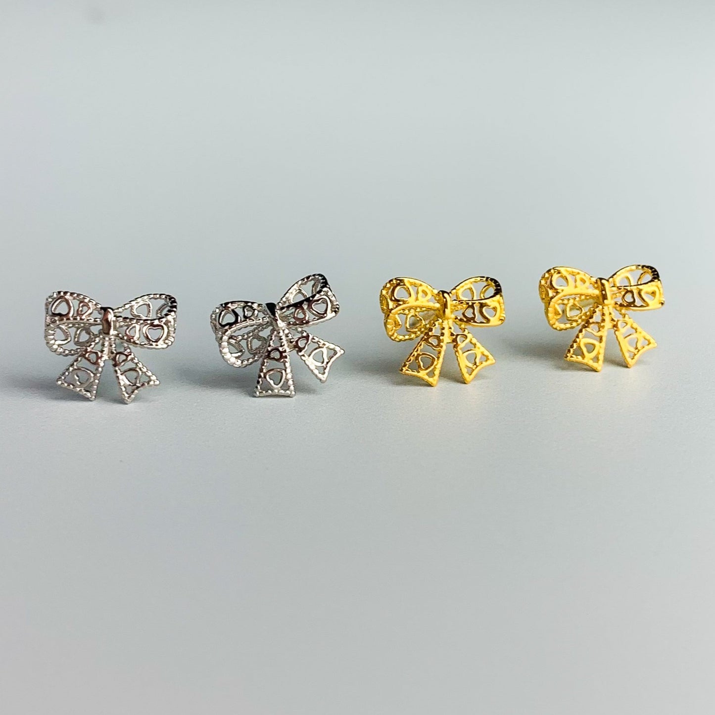 Heart Detail Bow Stud Earrings