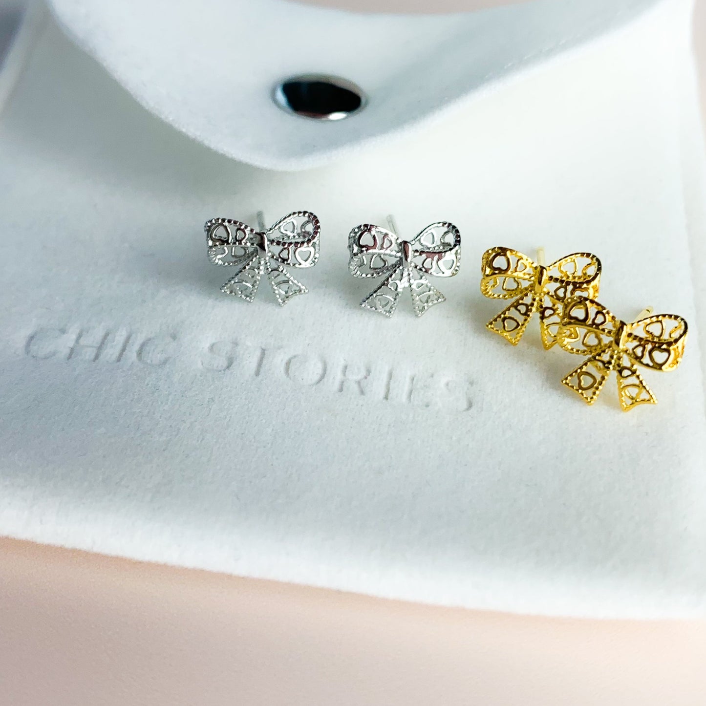 Heart Detail Bow Stud Earrings