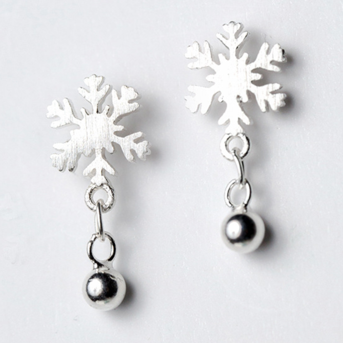 Silver 2025 snowflake earrings