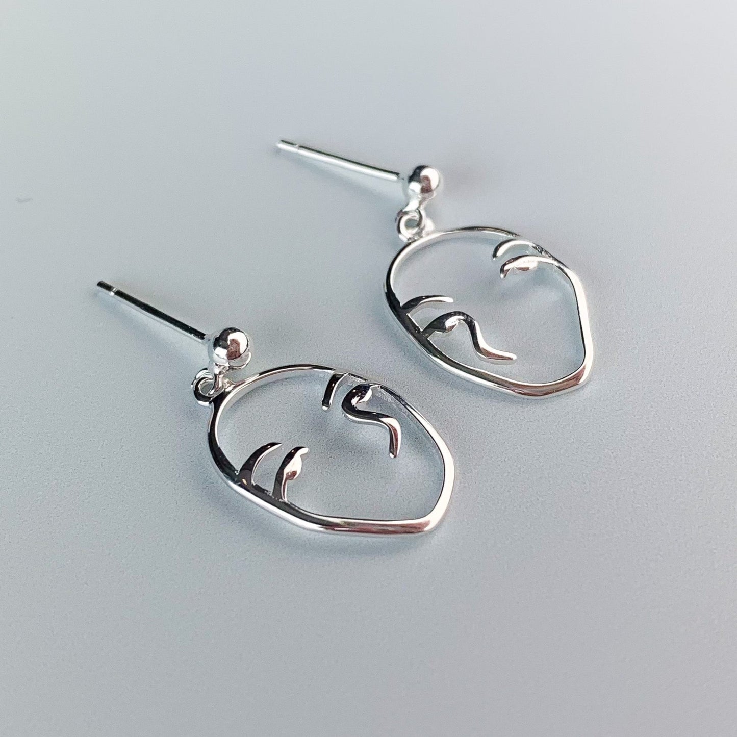 Abstract Face Dangle Stud Earrings