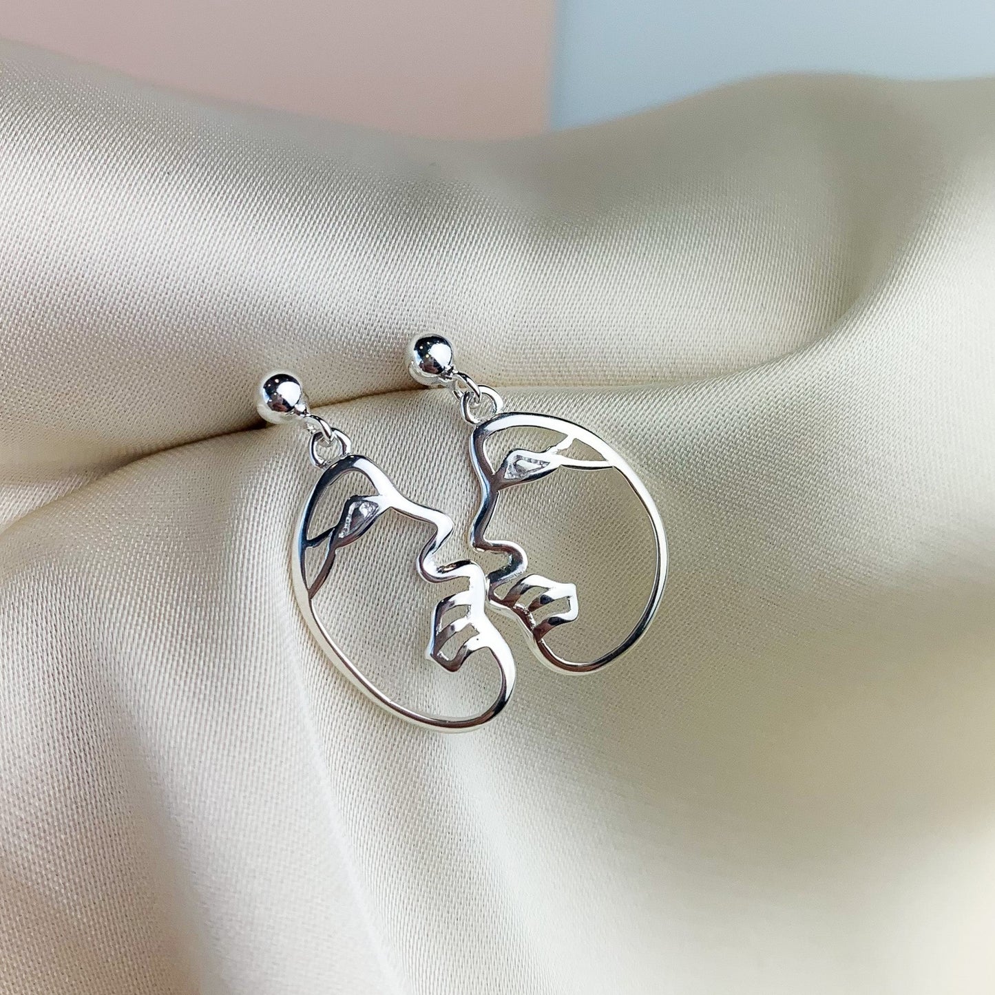 Abstract Face Dangle Stud Earrings