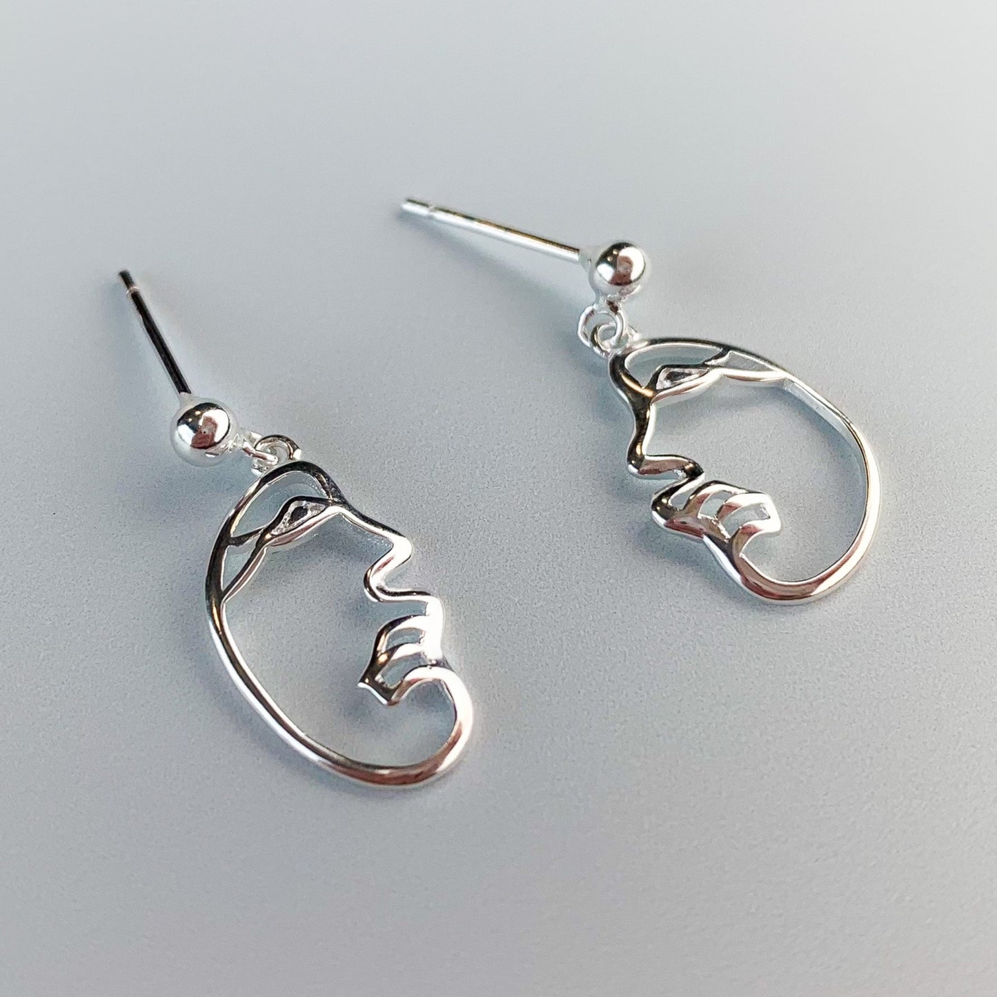 Abstract Face Dangle Stud Earrings