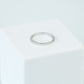 Silver ring on a white background