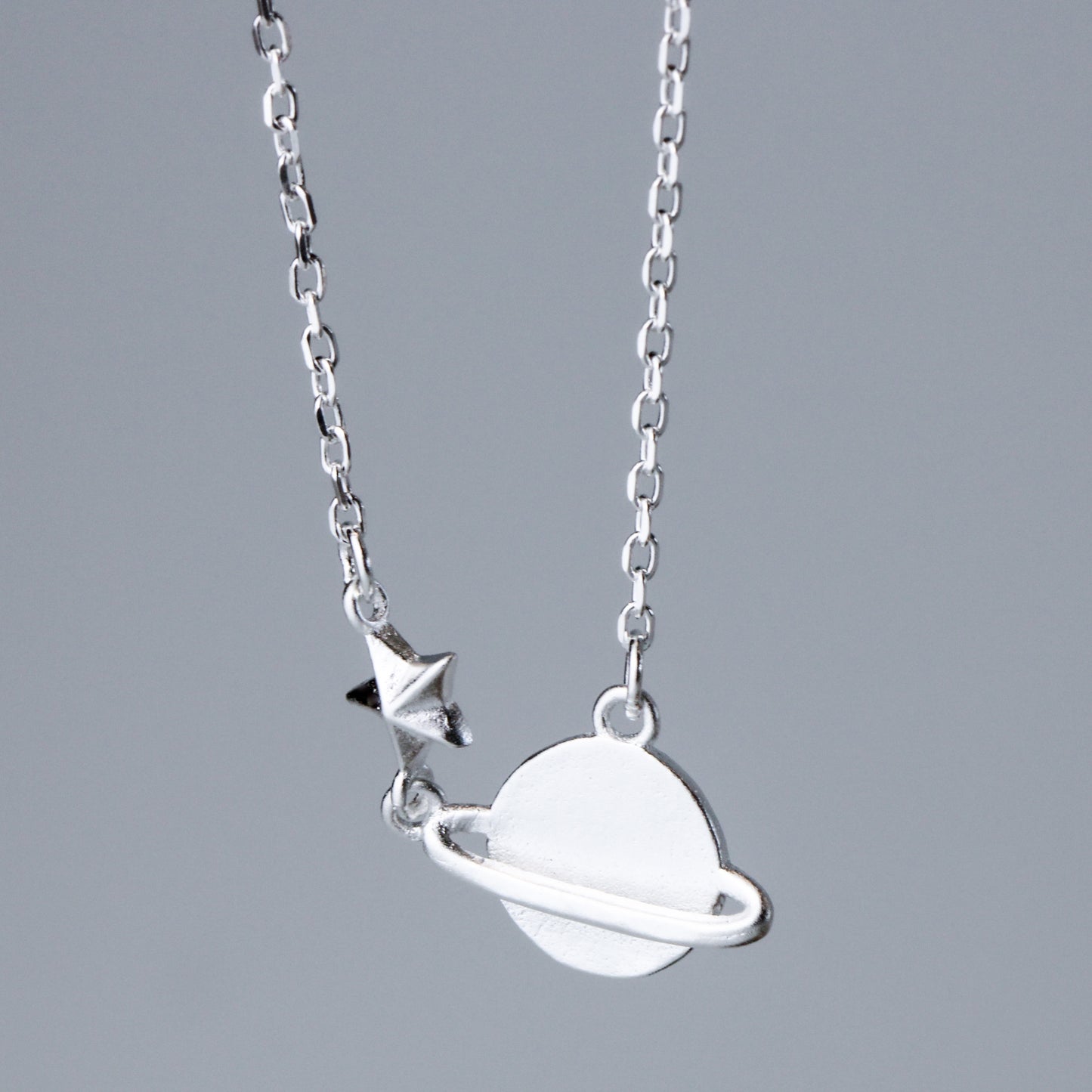 Saturn and Star Pendant Necklace