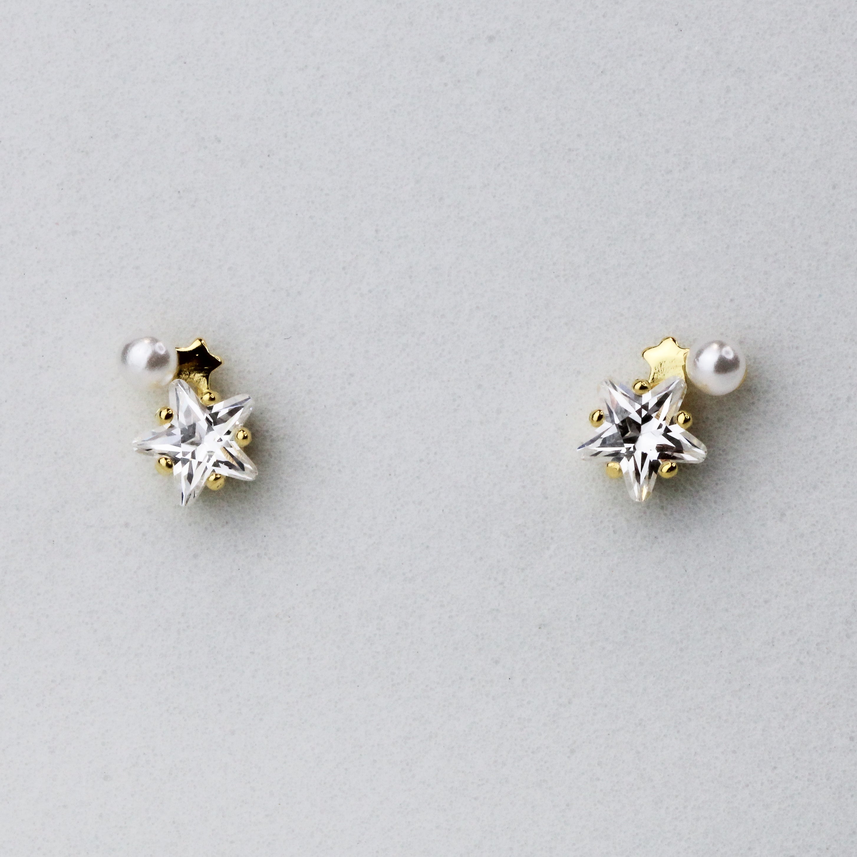 Star shaped earrings on sale gold