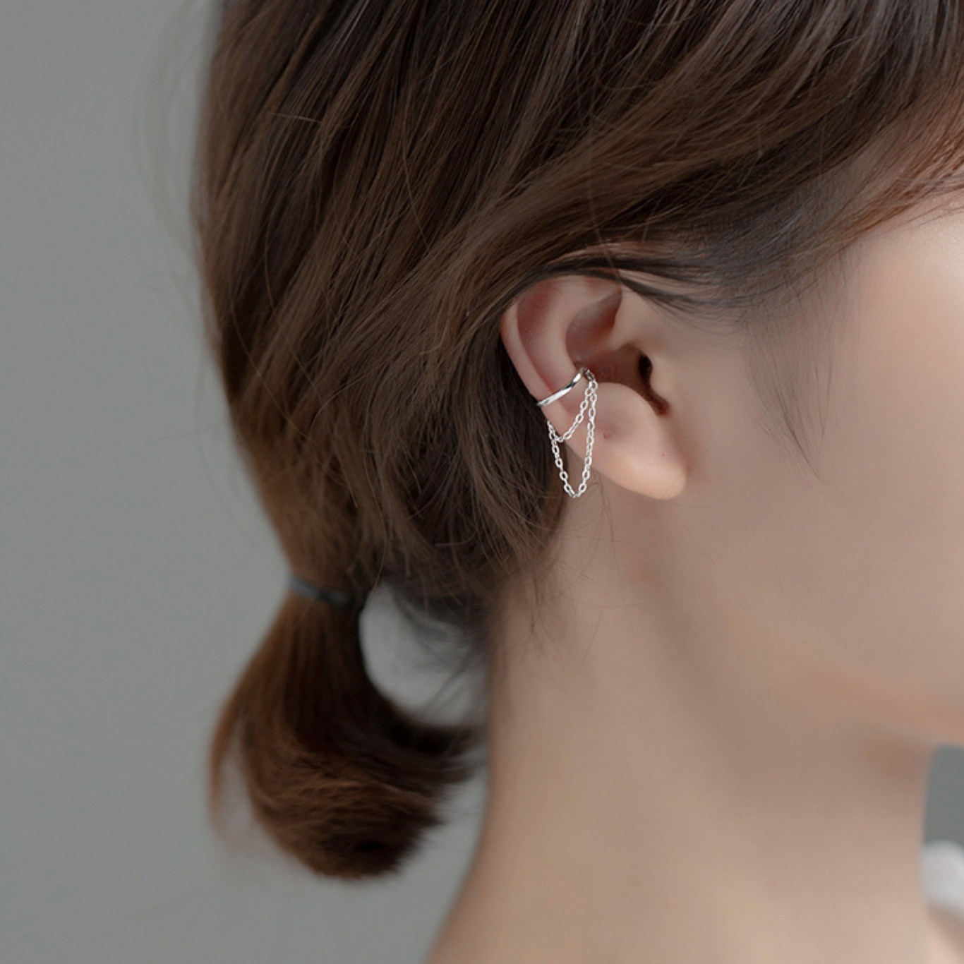 Silver 2025 cuff earrings